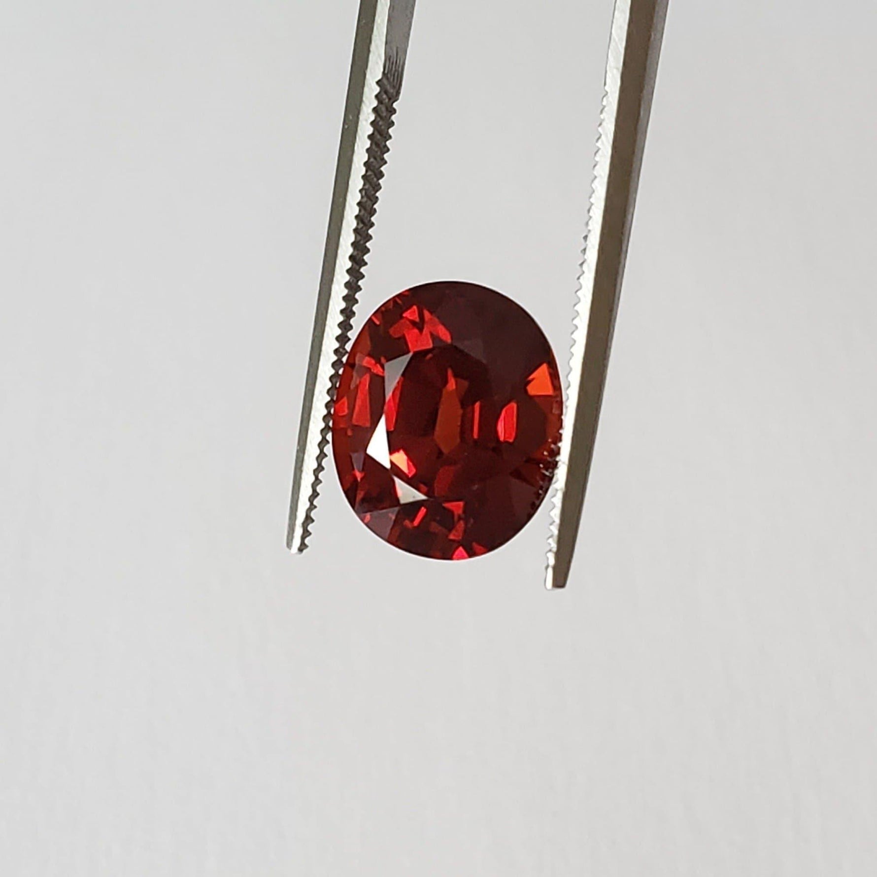  Spessartite Garnet | Unheated | Oval Cut | Orange Red | 10.8x9.1x6.57mm 5.65ct | Namibia 